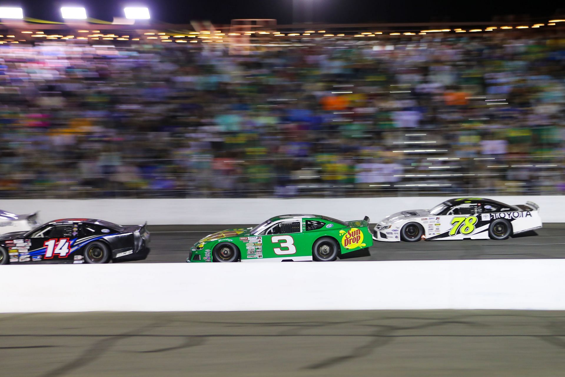 Dale Earnhardt Jr. (3) speeds down the front stretch during the 2022 Cars Tour LMSC 125. Source: Getty
